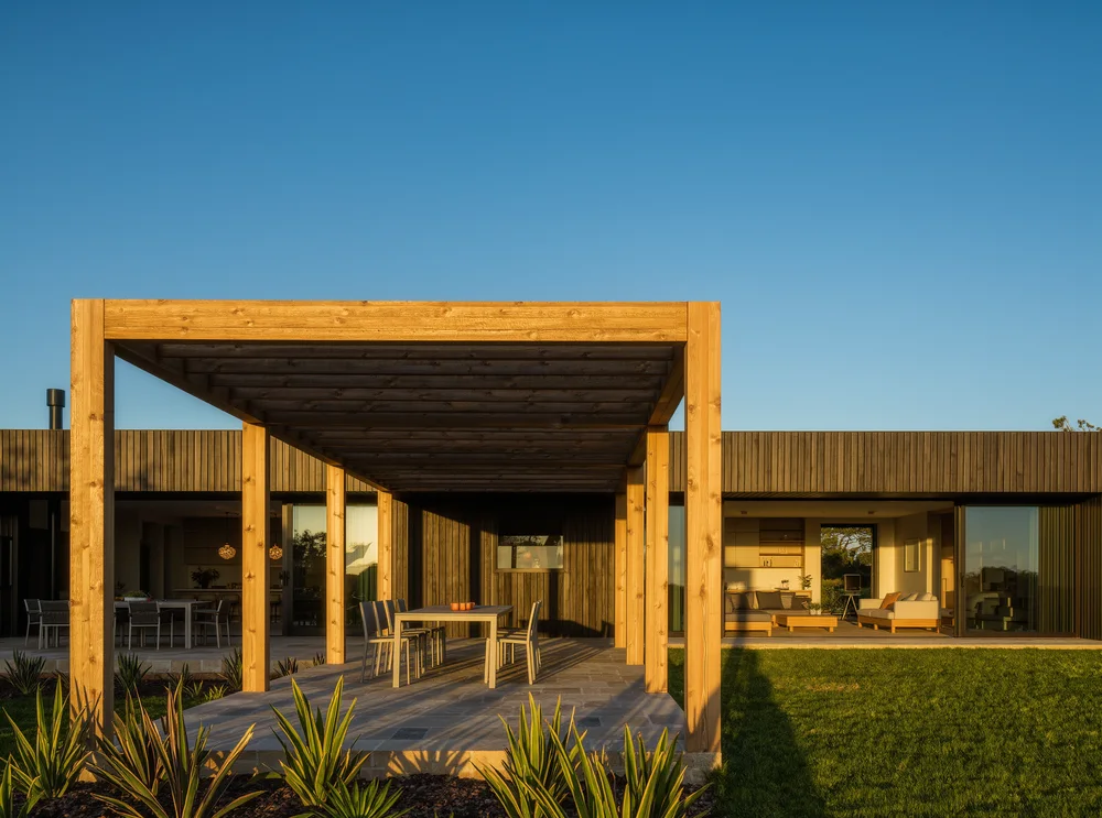 A timber pergola over an outdoor area
