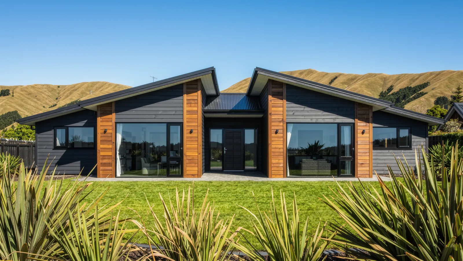 Finished new home with cedar and black cladding